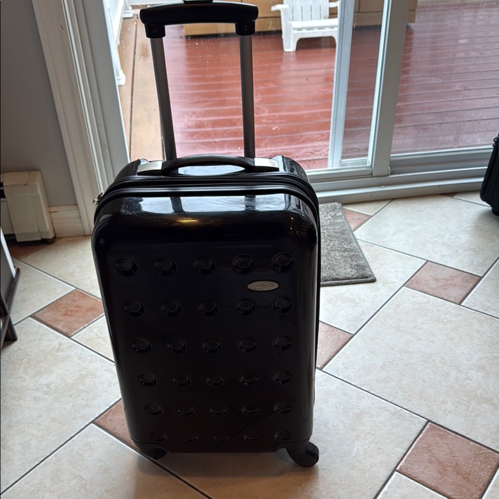 Black Hardshell Spinner Suitcase